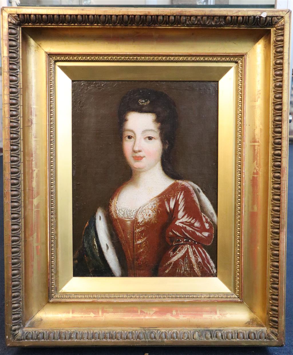 Late 17th century English School Portrait of a lady with brooch in her hair and ermine trimmed robes 15.5 x 11.5in.